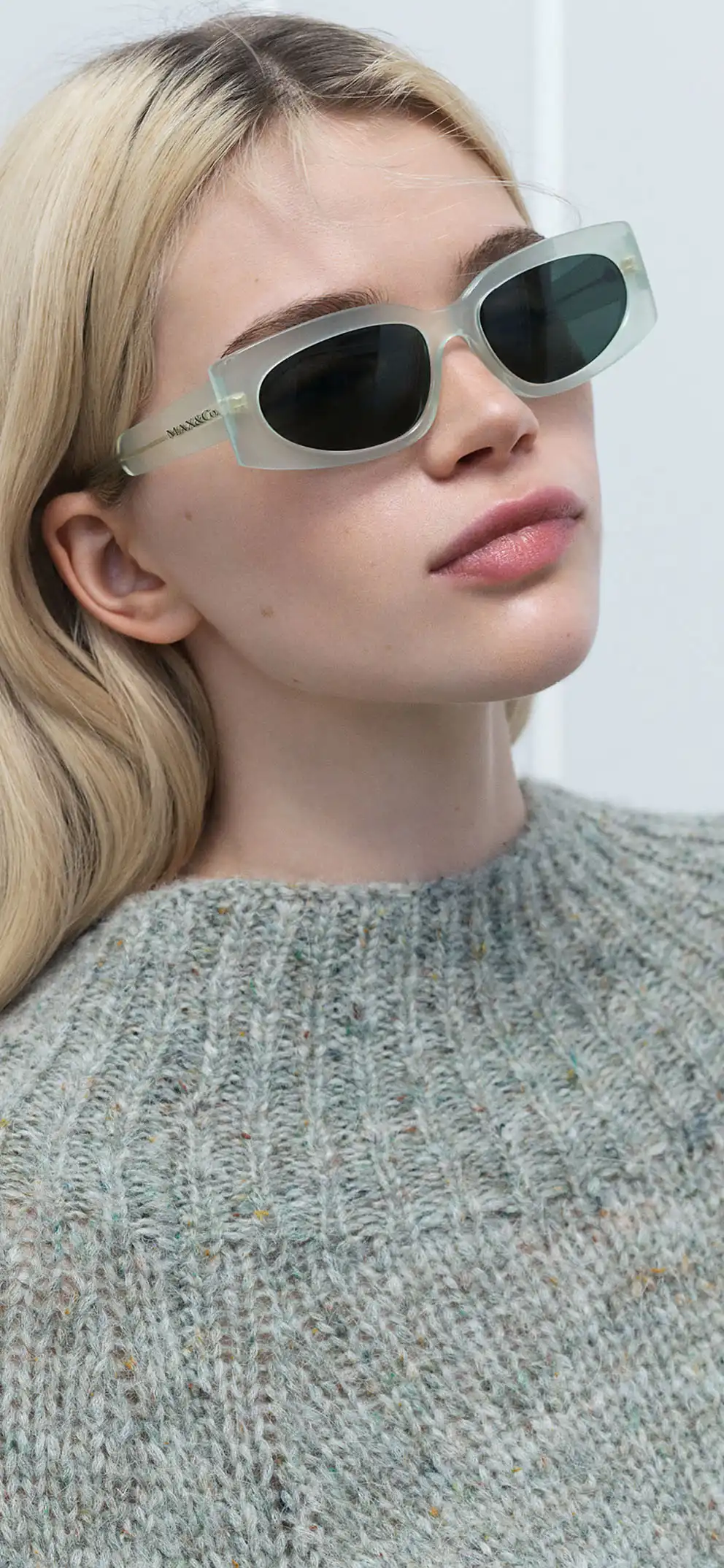 Woman wearing MAX&Co. sunglasses