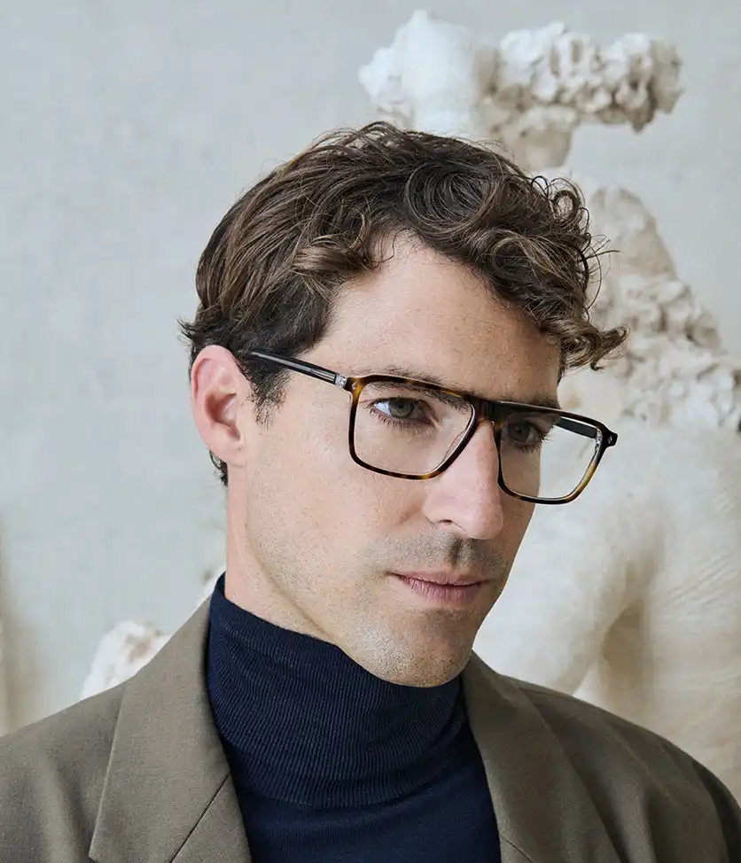 Man wearing WEB EYEWEAR eyeglasses